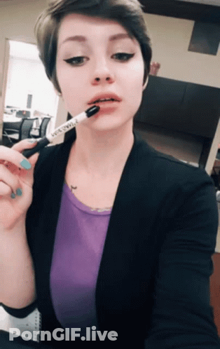 Brunette Cutie With Short Hair Sticking Out Her Tongue GIF