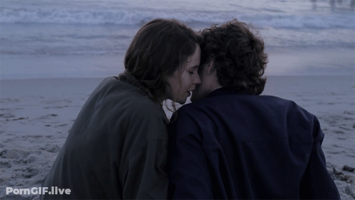 Hot Lips: A Sensual Encounter On The Beach GIF
