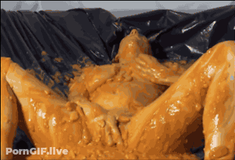 Sexy Slut In A Bucket Of Yellow Jelly GIF