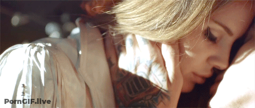 Tattooed Hottie's Sultry Seduction GIF