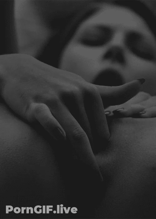 The Girl Puts Two Fingers In Her Pussy GIF