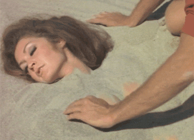 Big Tits Brunette Babe Gets Sandy GIF