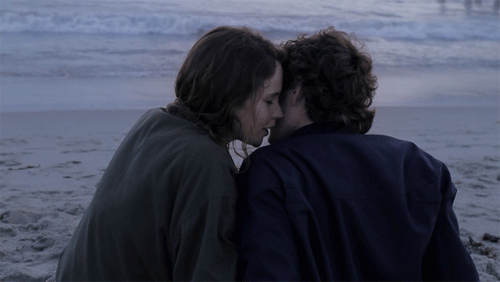 Hot Lips: A Sensual Encounter On The Beach GIF