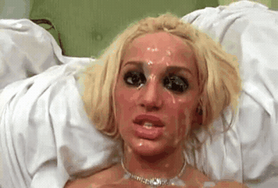 Bimbo Gets Cumface: A Sizzling Hot Cumshot Experience GIF