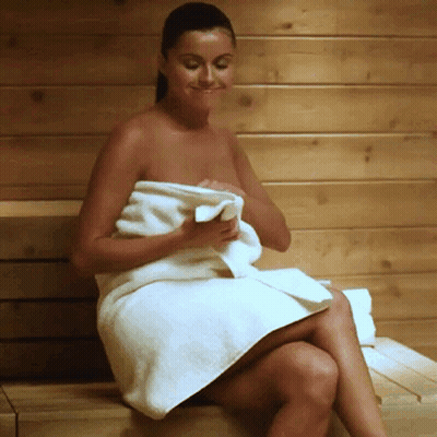 Brunette Amateur Gets Naked in Wooden Sauna