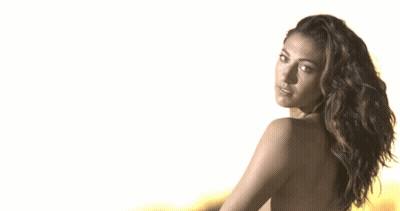 Brunette Babes: Christen Press's Sultry Stare GIF