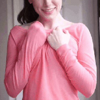 Brunette Undressing: Pink Shirt, Pink Undershirt, Pink Bra, Pink Lingerie GIF