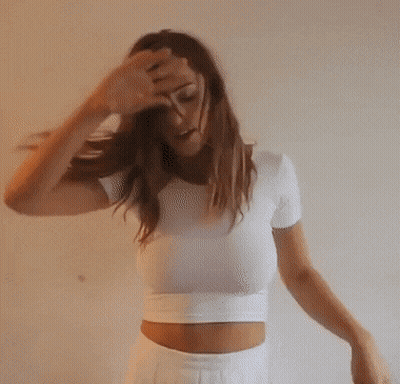 Busty Brunette Flashing Her Big Tits GIF