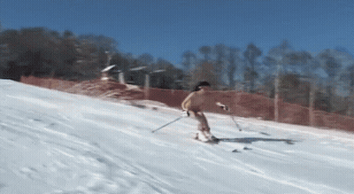 Funny Skier Gets Naked On The Slopes GIF