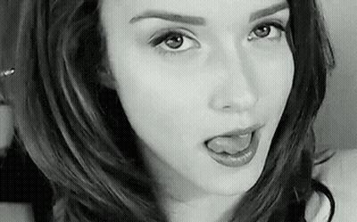 Hot Brunette Giving You A Taste Of Her Tongue GIF