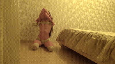 Smallish Bombshell Striptease In Bedroom GIF