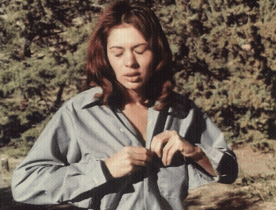 Undressing With Natural Tits: A Vintage Erotic Experience GIF
