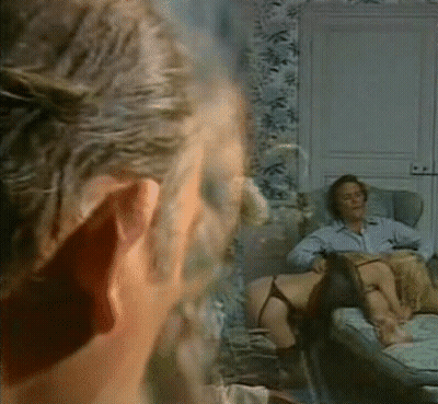 Voyeur's Delight: Watching A Hot Babe Get Naked GIF